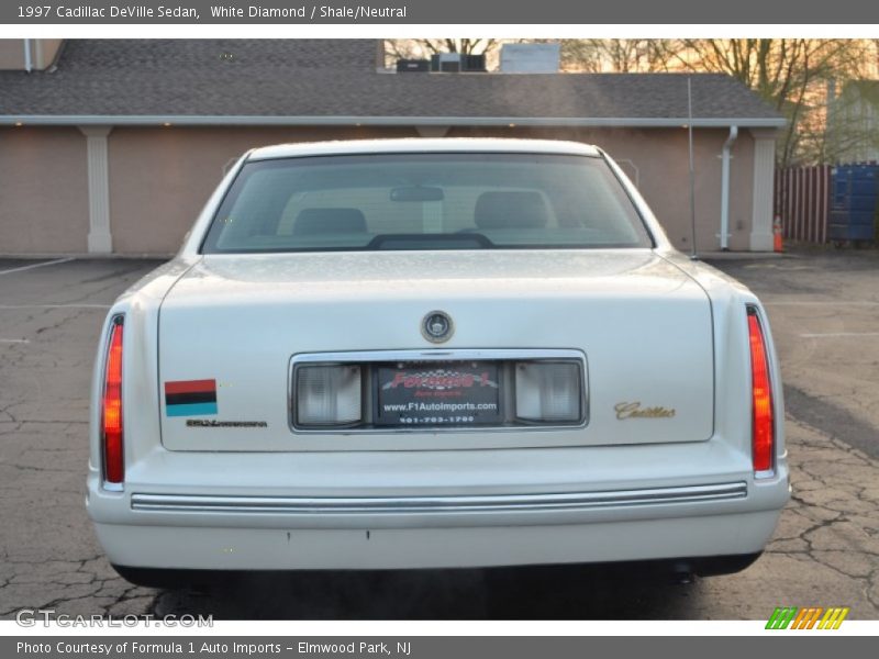 White Diamond / Shale/Neutral 1997 Cadillac DeVille Sedan