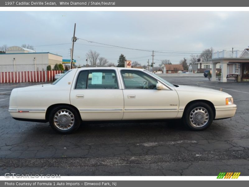 White Diamond / Shale/Neutral 1997 Cadillac DeVille Sedan