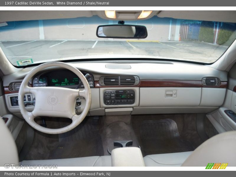 White Diamond / Shale/Neutral 1997 Cadillac DeVille Sedan