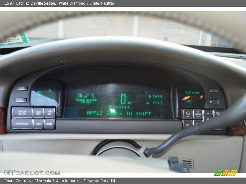 White Diamond / Shale/Neutral 1997 Cadillac DeVille Sedan