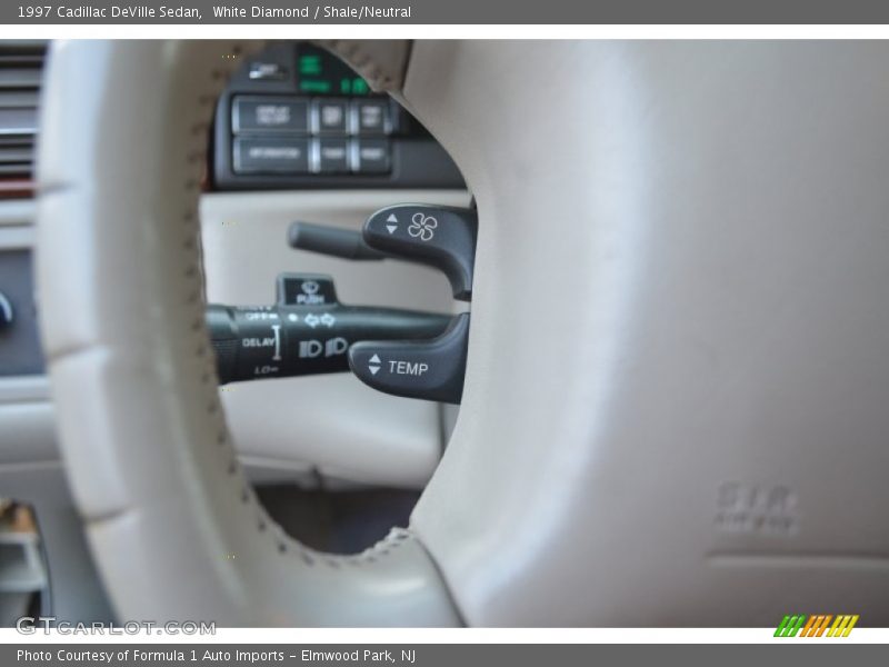 White Diamond / Shale/Neutral 1997 Cadillac DeVille Sedan