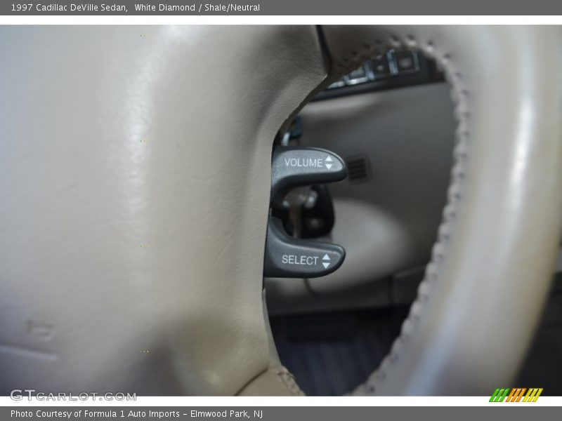 White Diamond / Shale/Neutral 1997 Cadillac DeVille Sedan