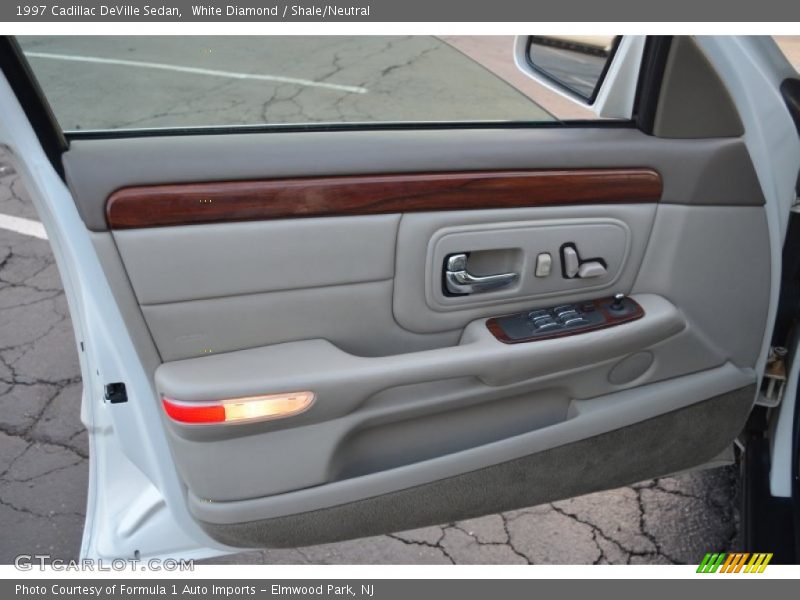 White Diamond / Shale/Neutral 1997 Cadillac DeVille Sedan