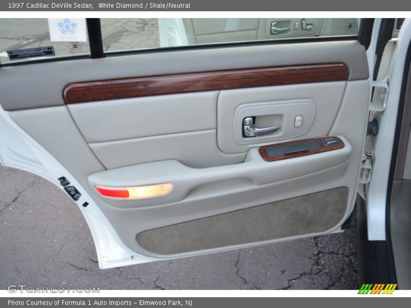 White Diamond / Shale/Neutral 1997 Cadillac DeVille Sedan