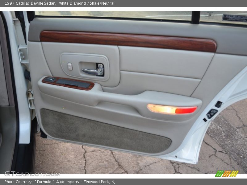 White Diamond / Shale/Neutral 1997 Cadillac DeVille Sedan