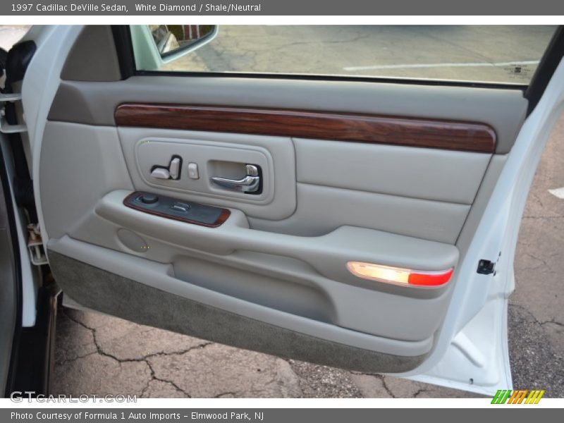 White Diamond / Shale/Neutral 1997 Cadillac DeVille Sedan