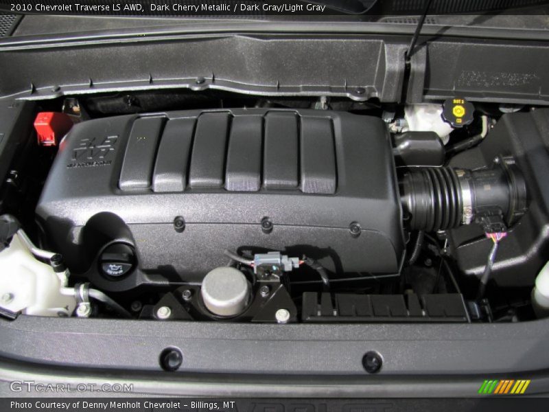 Dark Cherry Metallic / Dark Gray/Light Gray 2010 Chevrolet Traverse LS AWD