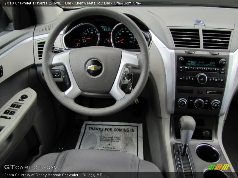 Dark Cherry Metallic / Dark Gray/Light Gray 2010 Chevrolet Traverse LS AWD