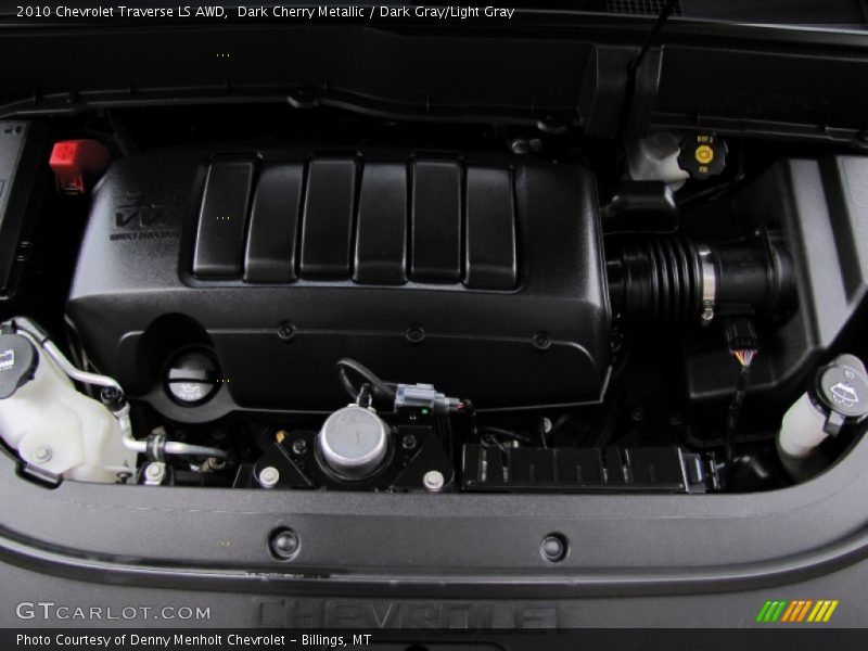 Dark Cherry Metallic / Dark Gray/Light Gray 2010 Chevrolet Traverse LS AWD