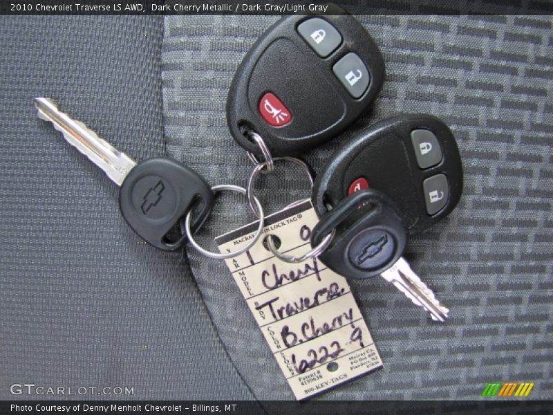 Dark Cherry Metallic / Dark Gray/Light Gray 2010 Chevrolet Traverse LS AWD