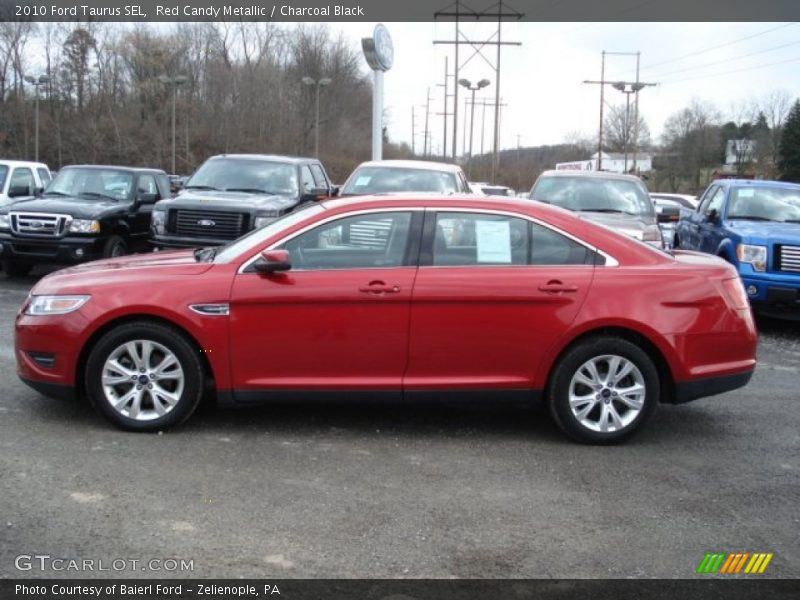 Red Candy Metallic / Charcoal Black 2010 Ford Taurus SEL