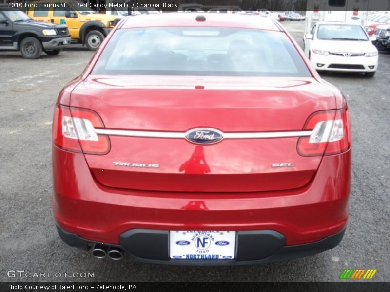 Red Candy Metallic / Charcoal Black 2010 Ford Taurus SEL