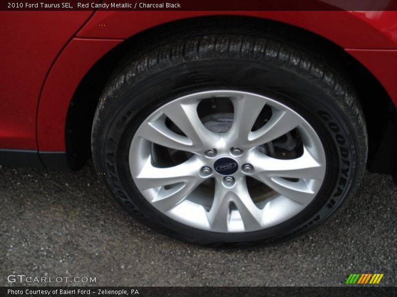 Red Candy Metallic / Charcoal Black 2010 Ford Taurus SEL