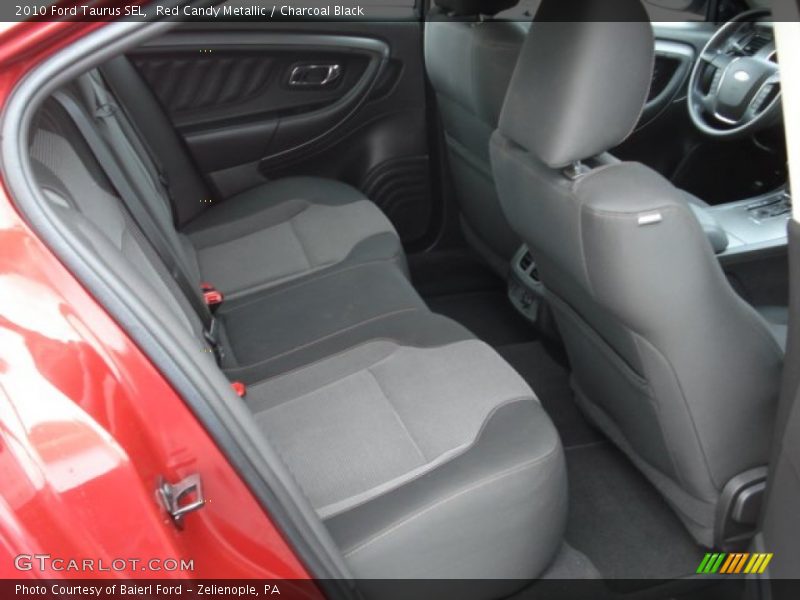 Red Candy Metallic / Charcoal Black 2010 Ford Taurus SEL
