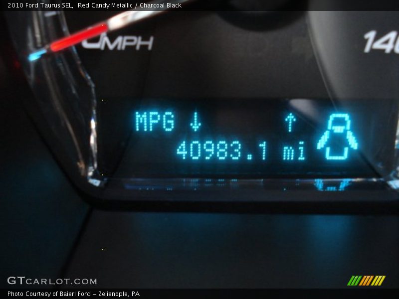Red Candy Metallic / Charcoal Black 2010 Ford Taurus SEL