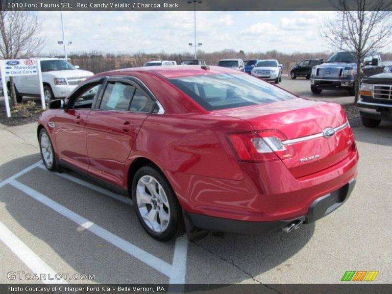 Red Candy Metallic / Charcoal Black 2010 Ford Taurus SEL