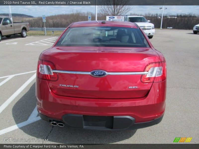Red Candy Metallic / Charcoal Black 2010 Ford Taurus SEL