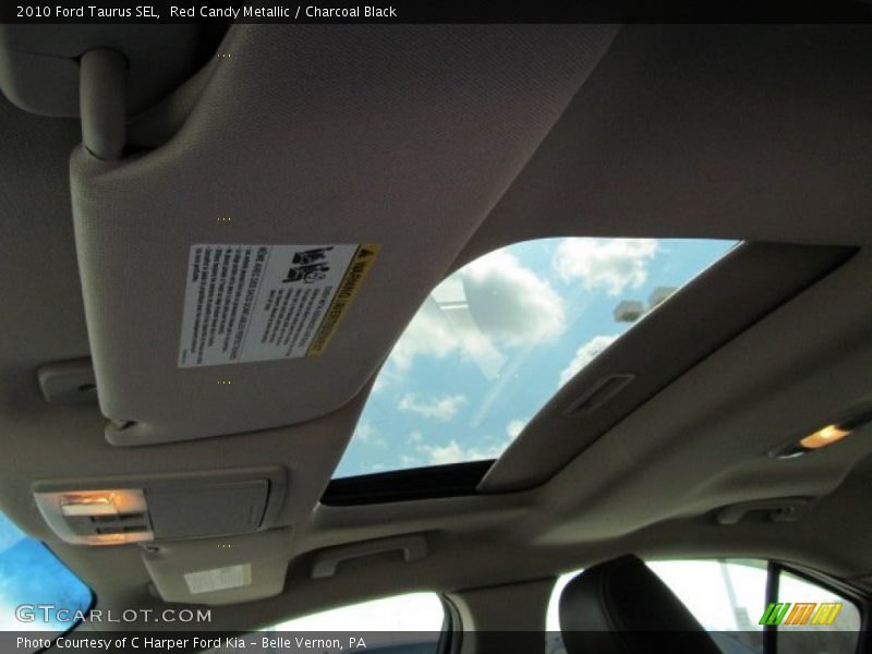 Red Candy Metallic / Charcoal Black 2010 Ford Taurus SEL