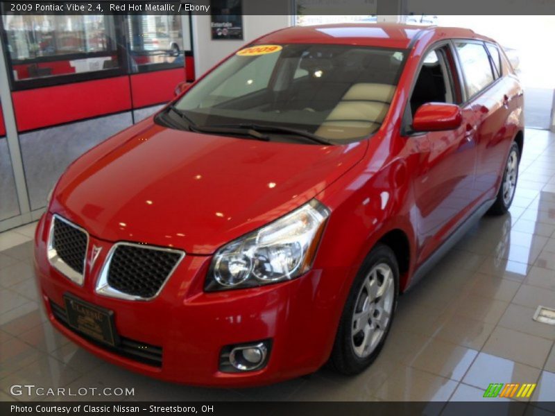 Red Hot Metallic / Ebony 2009 Pontiac Vibe 2.4