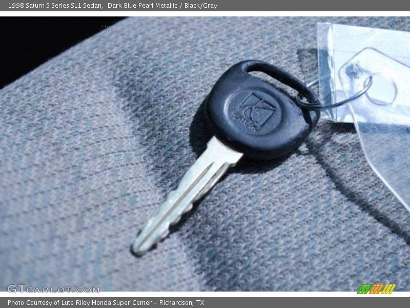 Dark Blue Pearl Metallic / Black/Gray 1998 Saturn S Series SL1 Sedan
