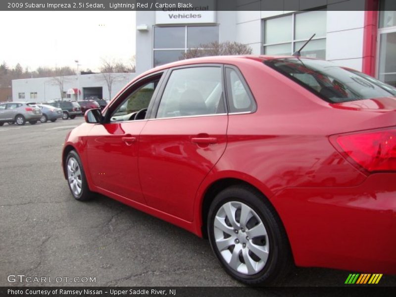 Lightning Red / Carbon Black 2009 Subaru Impreza 2.5i Sedan