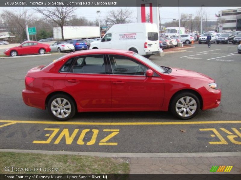 Lightning Red / Carbon Black 2009 Subaru Impreza 2.5i Sedan