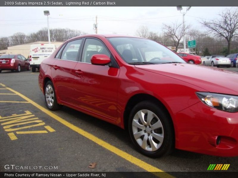 Lightning Red / Carbon Black 2009 Subaru Impreza 2.5i Sedan