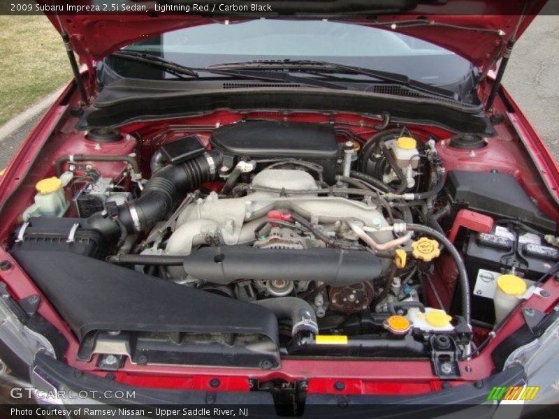 Lightning Red / Carbon Black 2009 Subaru Impreza 2.5i Sedan