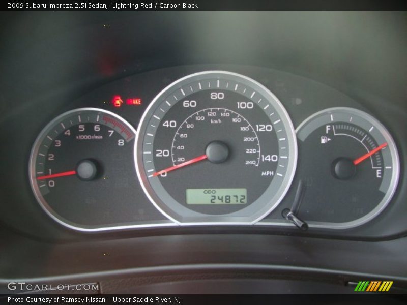 Lightning Red / Carbon Black 2009 Subaru Impreza 2.5i Sedan
