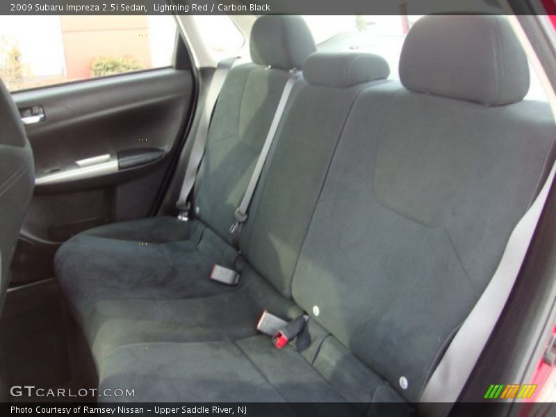 Lightning Red / Carbon Black 2009 Subaru Impreza 2.5i Sedan