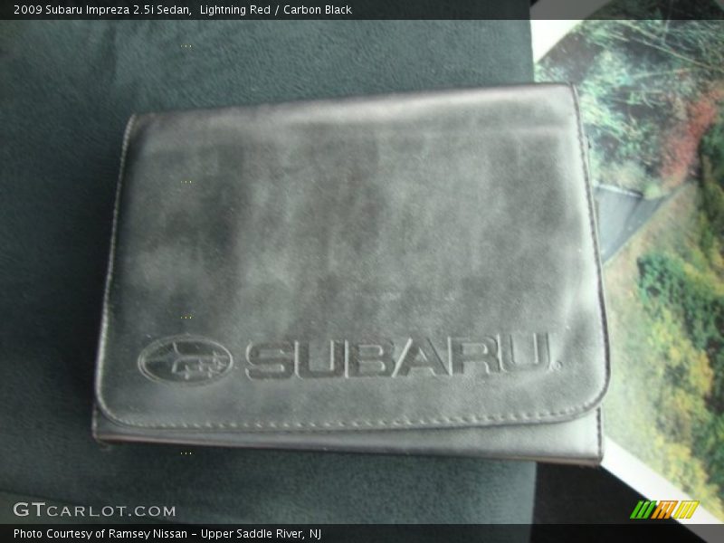 Lightning Red / Carbon Black 2009 Subaru Impreza 2.5i Sedan