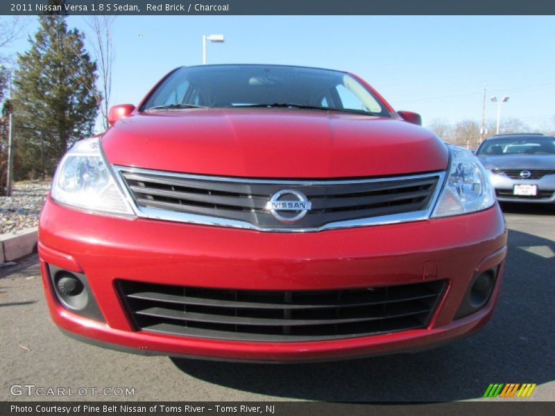 Red Brick / Charcoal 2011 Nissan Versa 1.8 S Sedan