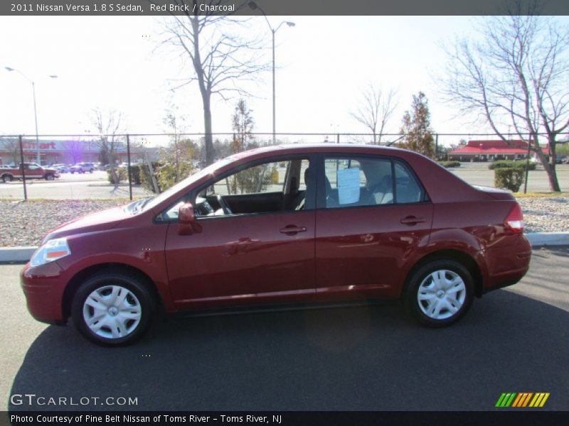 Red Brick / Charcoal 2011 Nissan Versa 1.8 S Sedan