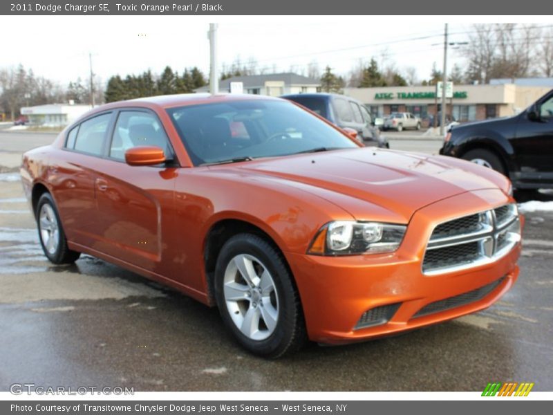 Toxic Orange Pearl / Black 2011 Dodge Charger SE