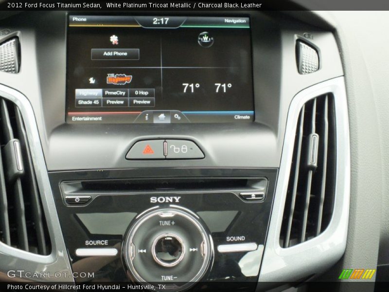 White Platinum Tricoat Metallic / Charcoal Black Leather 2012 Ford Focus Titanium Sedan