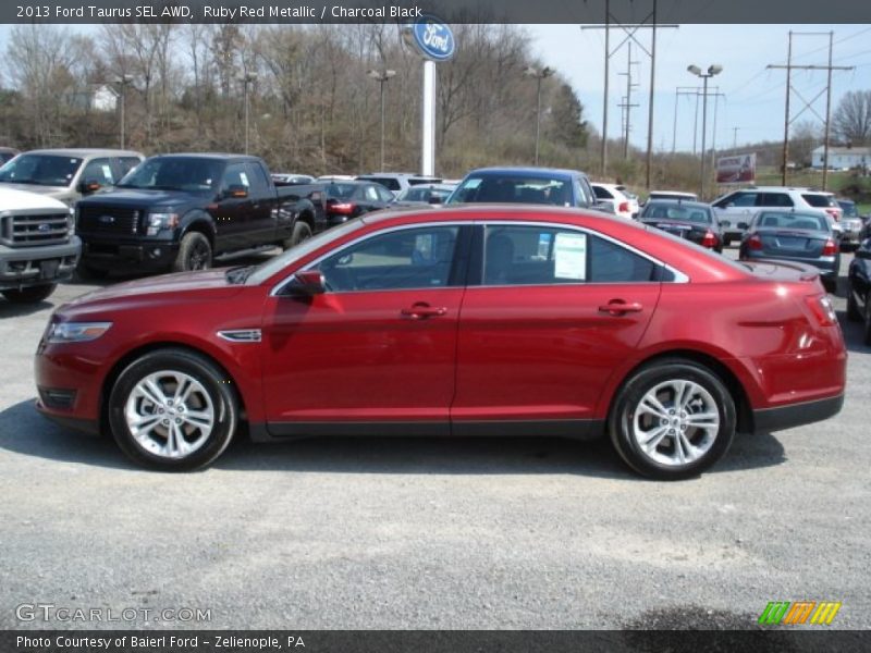Ruby Red Metallic / Charcoal Black 2013 Ford Taurus SEL AWD