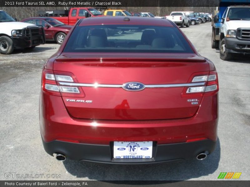 Ruby Red Metallic / Charcoal Black 2013 Ford Taurus SEL AWD