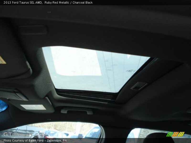 Ruby Red Metallic / Charcoal Black 2013 Ford Taurus SEL AWD