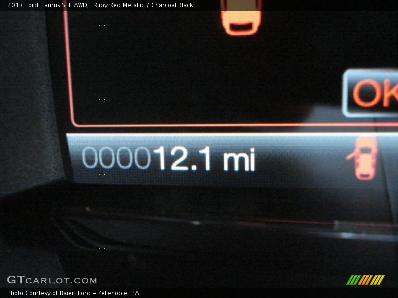 Ruby Red Metallic / Charcoal Black 2013 Ford Taurus SEL AWD