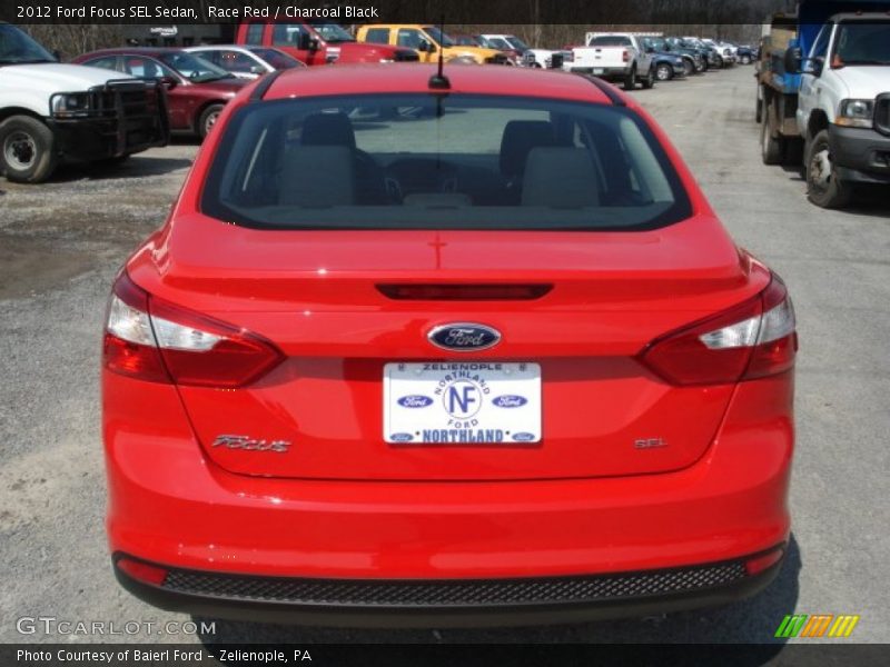 Race Red / Charcoal Black 2012 Ford Focus SEL Sedan