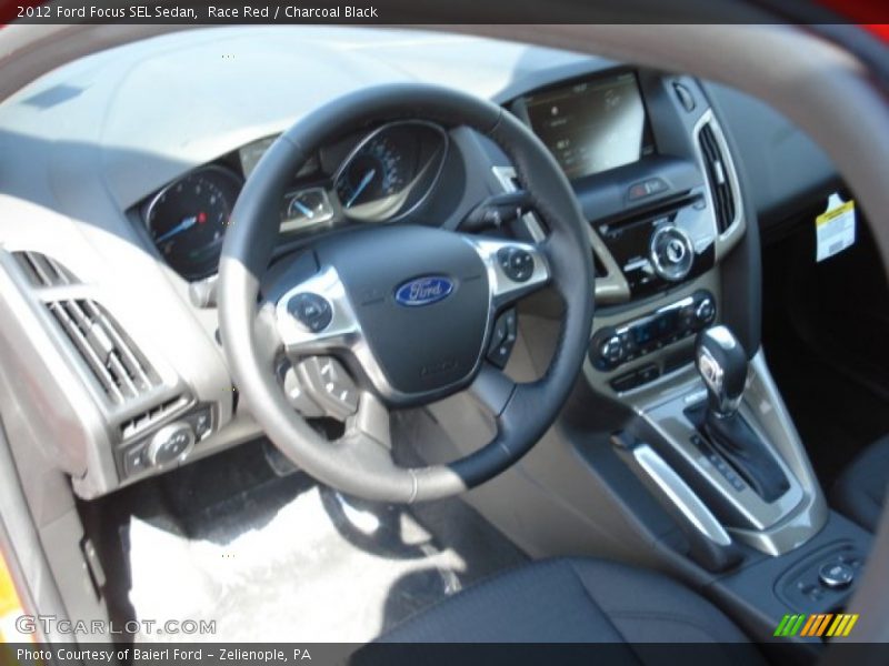 Race Red / Charcoal Black 2012 Ford Focus SEL Sedan