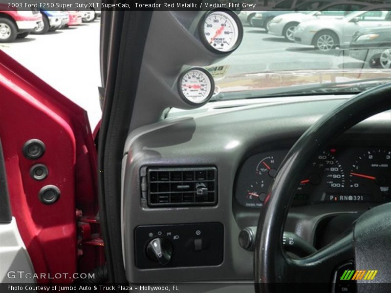 Toreador Red Metallic / Medium Flint Grey 2003 Ford F250 Super Duty XLT SuperCab