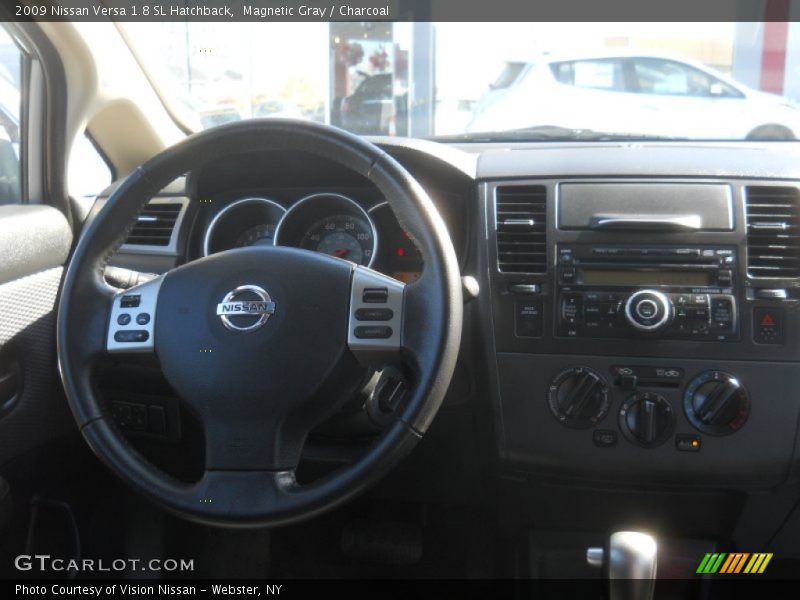 Magnetic Gray / Charcoal 2009 Nissan Versa 1.8 SL Hatchback