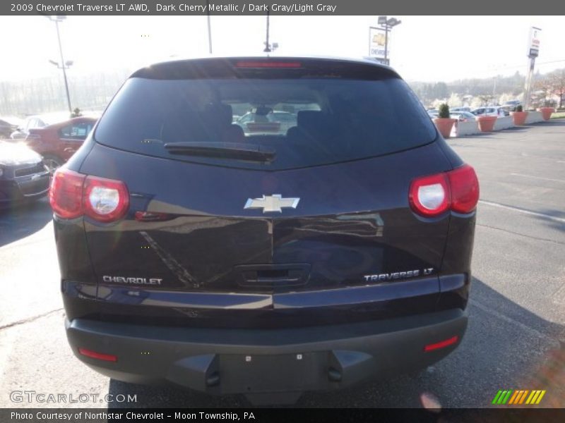 Dark Cherry Metallic / Dark Gray/Light Gray 2009 Chevrolet Traverse LT AWD