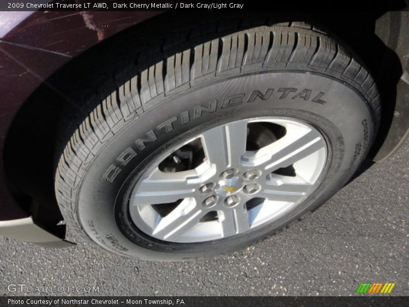 Dark Cherry Metallic / Dark Gray/Light Gray 2009 Chevrolet Traverse LT AWD