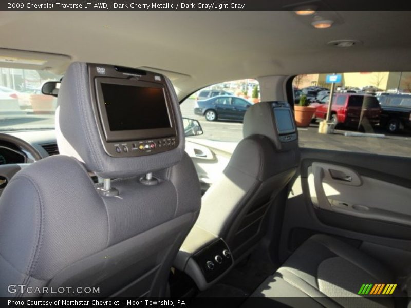 Dark Cherry Metallic / Dark Gray/Light Gray 2009 Chevrolet Traverse LT AWD