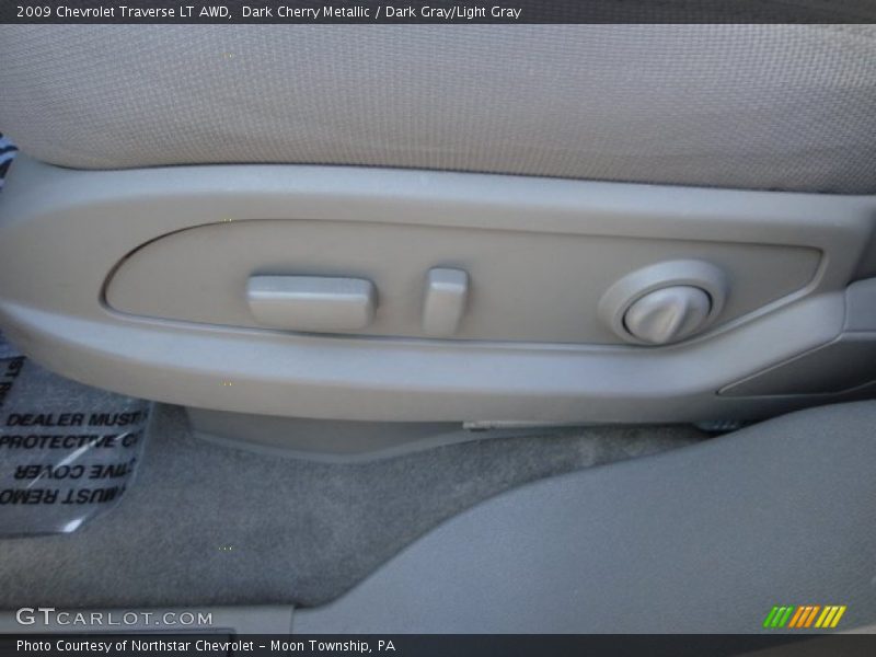 Dark Cherry Metallic / Dark Gray/Light Gray 2009 Chevrolet Traverse LT AWD