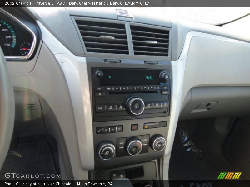 Dark Cherry Metallic / Dark Gray/Light Gray 2009 Chevrolet Traverse LT AWD