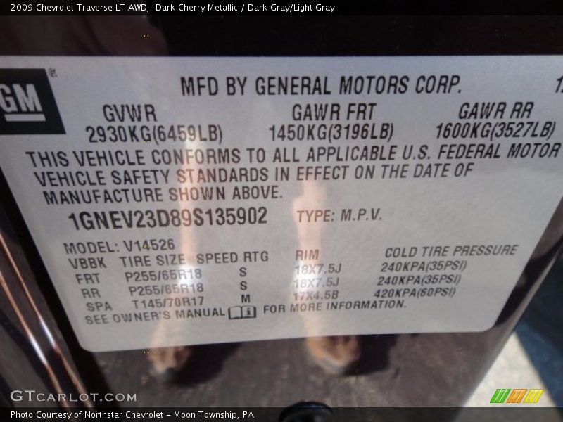 Dark Cherry Metallic / Dark Gray/Light Gray 2009 Chevrolet Traverse LT AWD