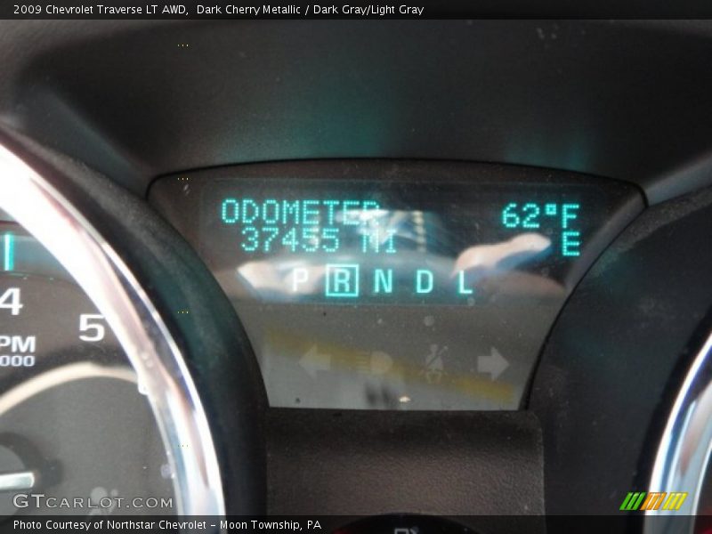 Dark Cherry Metallic / Dark Gray/Light Gray 2009 Chevrolet Traverse LT AWD